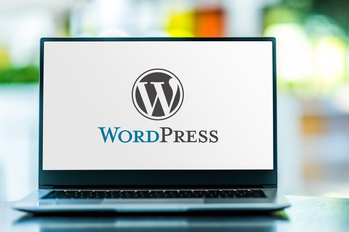 POZNAN, POL - FEB 6, 2021: Laptop computer displaying logo of WordPress, a free and open-source content management system (CMS) written in PHP and paired with a MySQL or MariaDB database